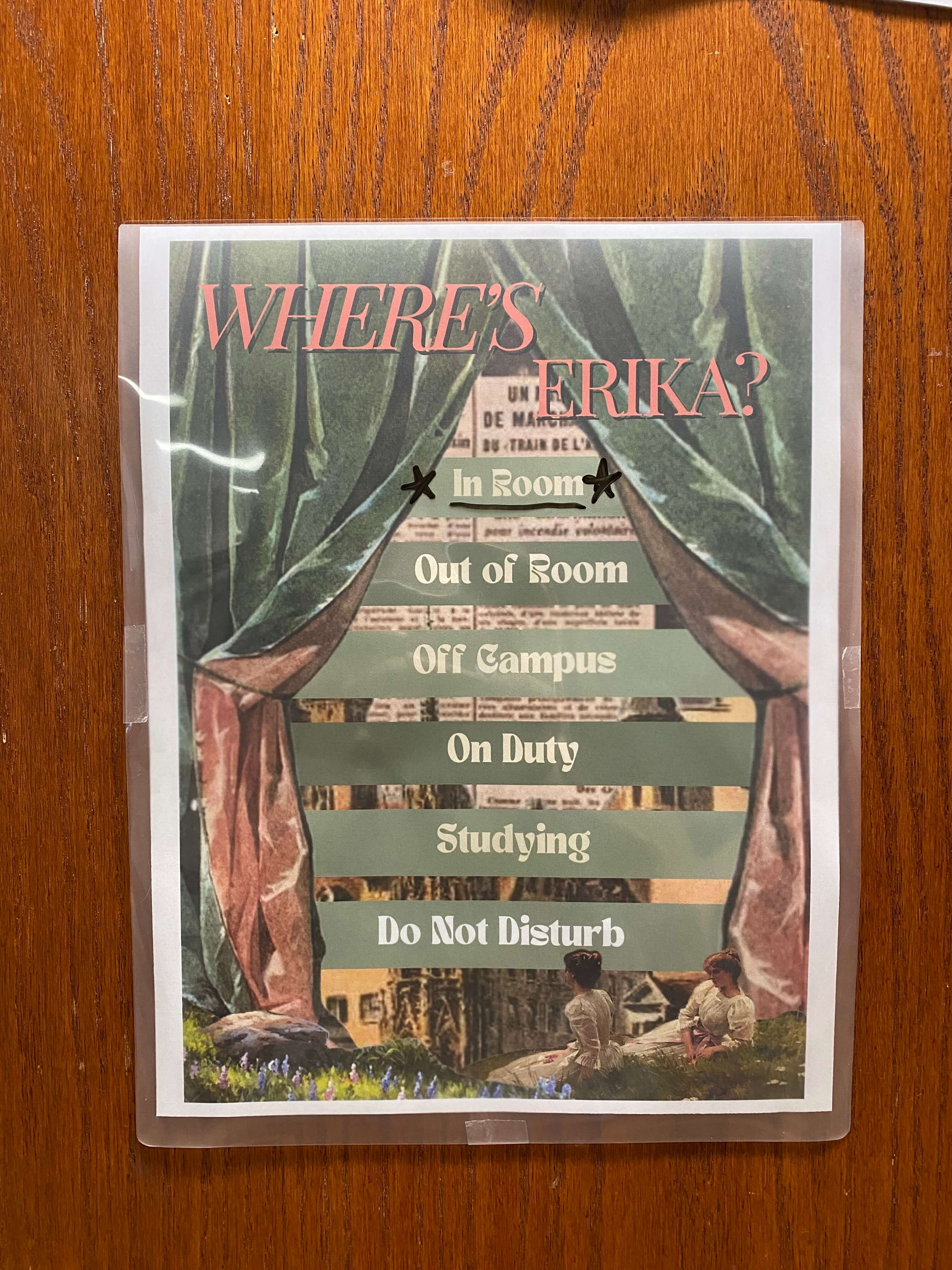 Sign on a door indicating the location of Erika.